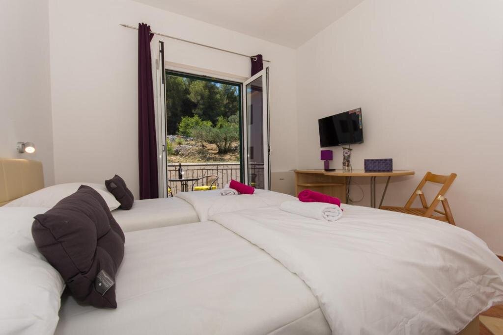 Twin room with balcony at Guesthouse Vakans
